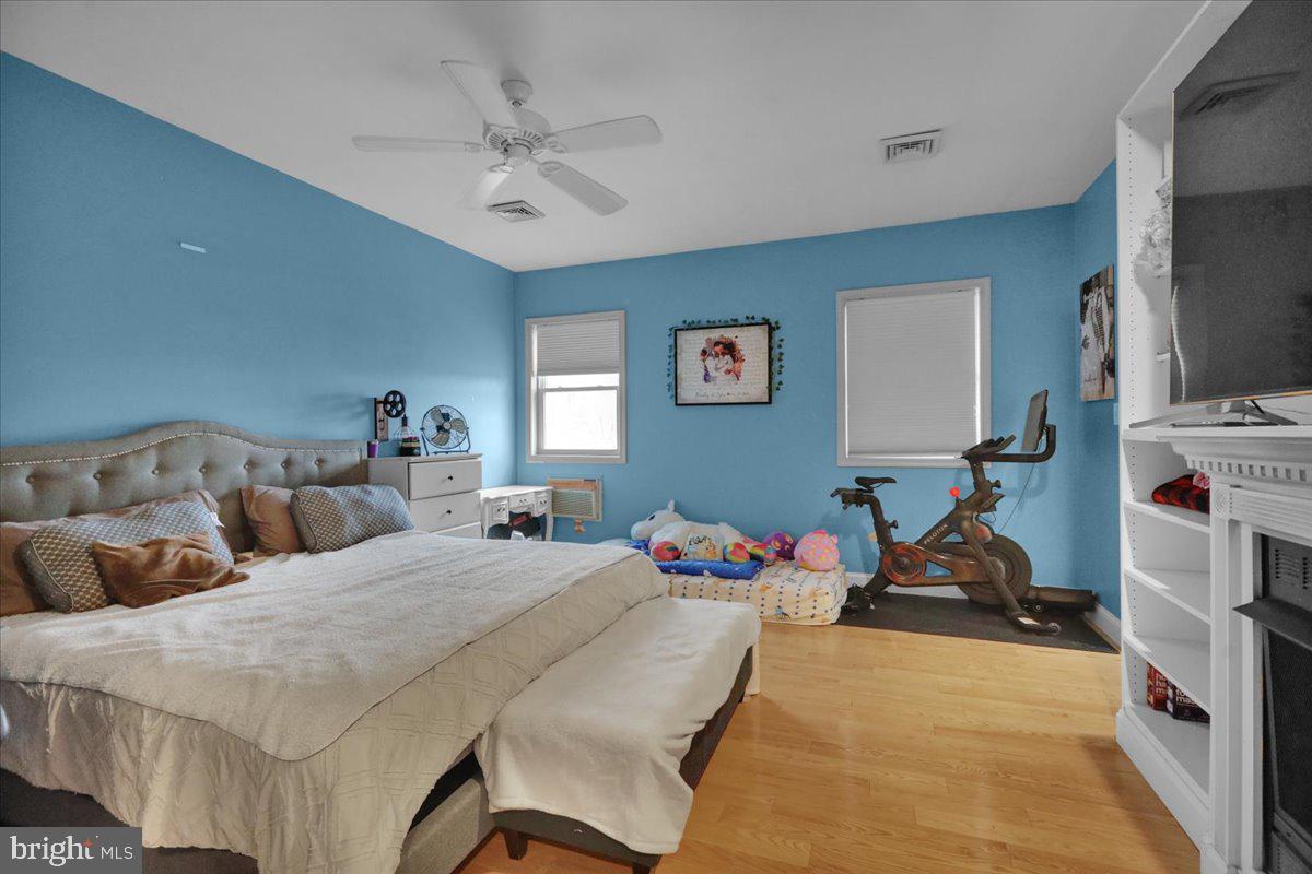 12 Trimble Boulevard Brookhaven, PA 19015 - Photo 17 of 34 a bedroom with double bed and a flat screen tv