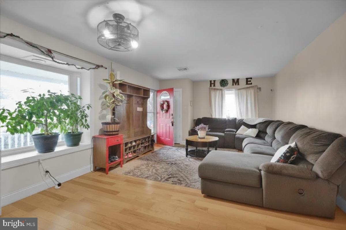 12 Trimble Boulevard Brookhaven, PA 19015 - Photo 2 of 34 a living room with furniture and a potted plant