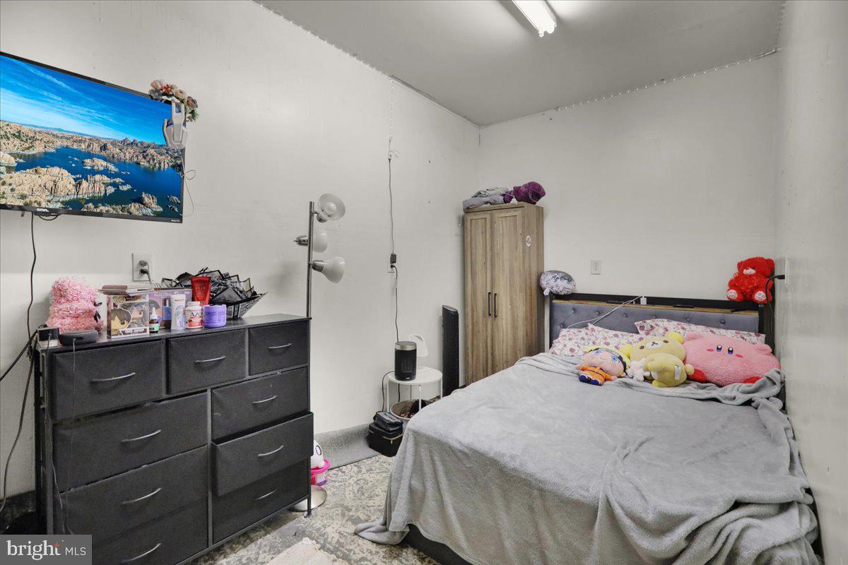 12 Trimble Boulevard Brookhaven, PA 19015 - Photo 23 of 34 a bedroom with a bed and dresser