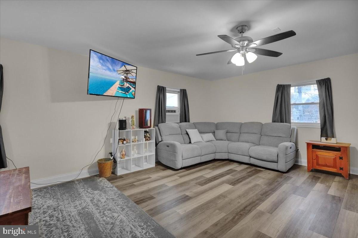 12 Trimble Boulevard Brookhaven, PA 19015 - Photo 26 of 34 a living room with furniture and a wooden floor