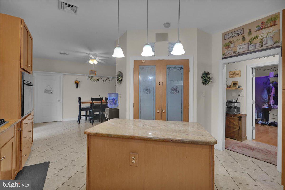 12 Trimble Boulevard Brookhaven, PA 19015 - Photo 10 of 34 a view of a kitchen and a chandelier