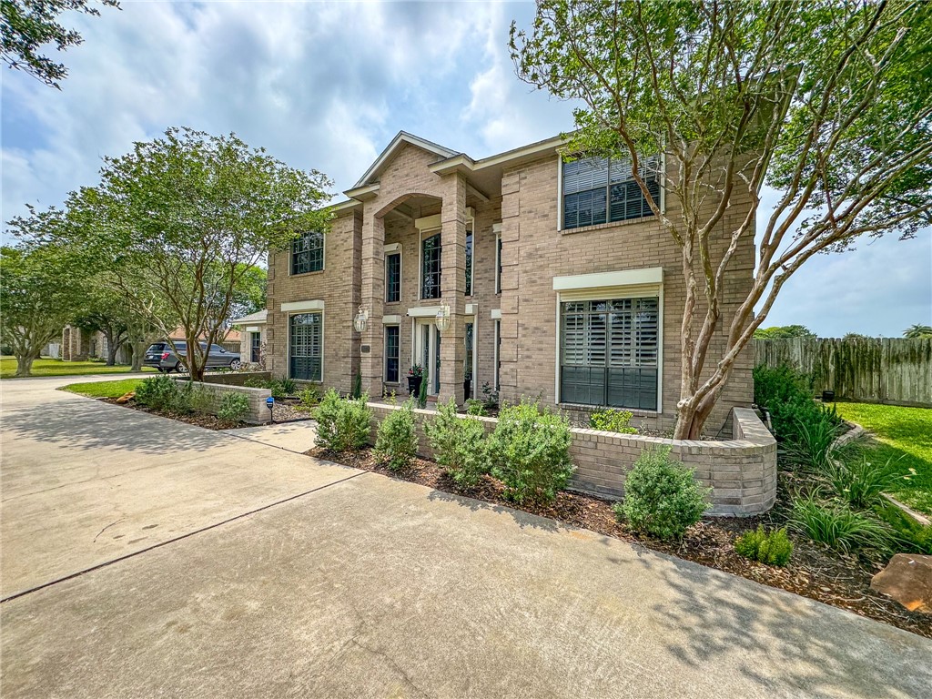 Undisclosed Address Corpus Christi, TX 78413 - Photo 1 of 1 front view of a house with a yard