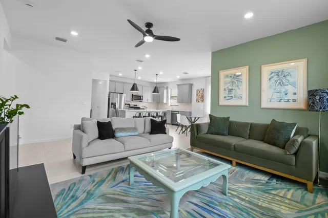 a view of kitchen with cabinets and wooden floor