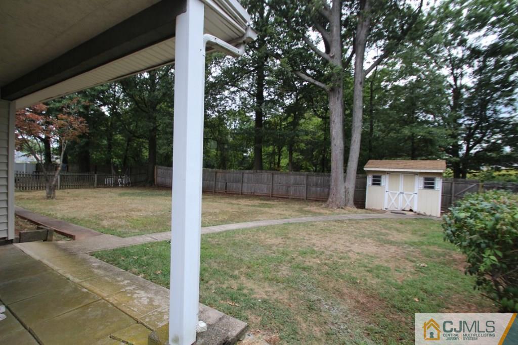 21 Sturgis Road Edison, NJ 08817 - Photo 17 of 18 a view of backyard with green space