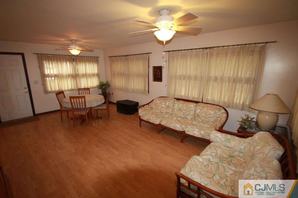 21 Sturgis Road Edison, NJ 08817 - Photo 7 of 18 a bedroom with furniture and a large window