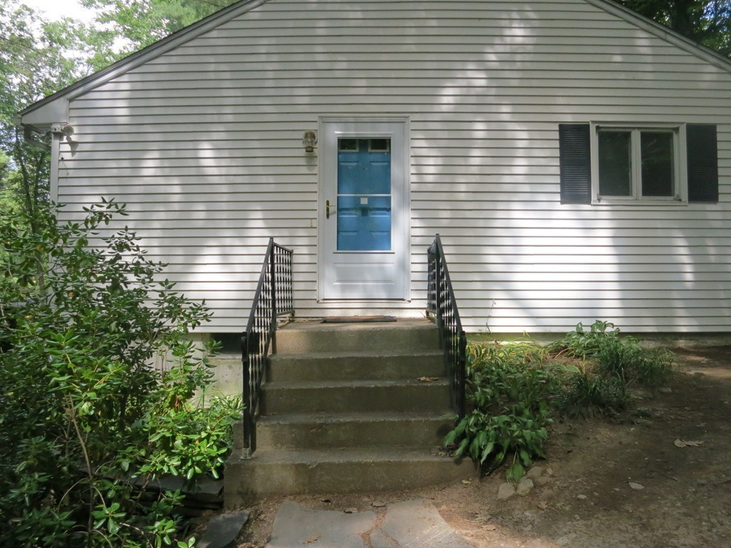 4 Harkness Road Pelham, MA 01002 - Photo 29 of 29 a view of house with window and potted plants