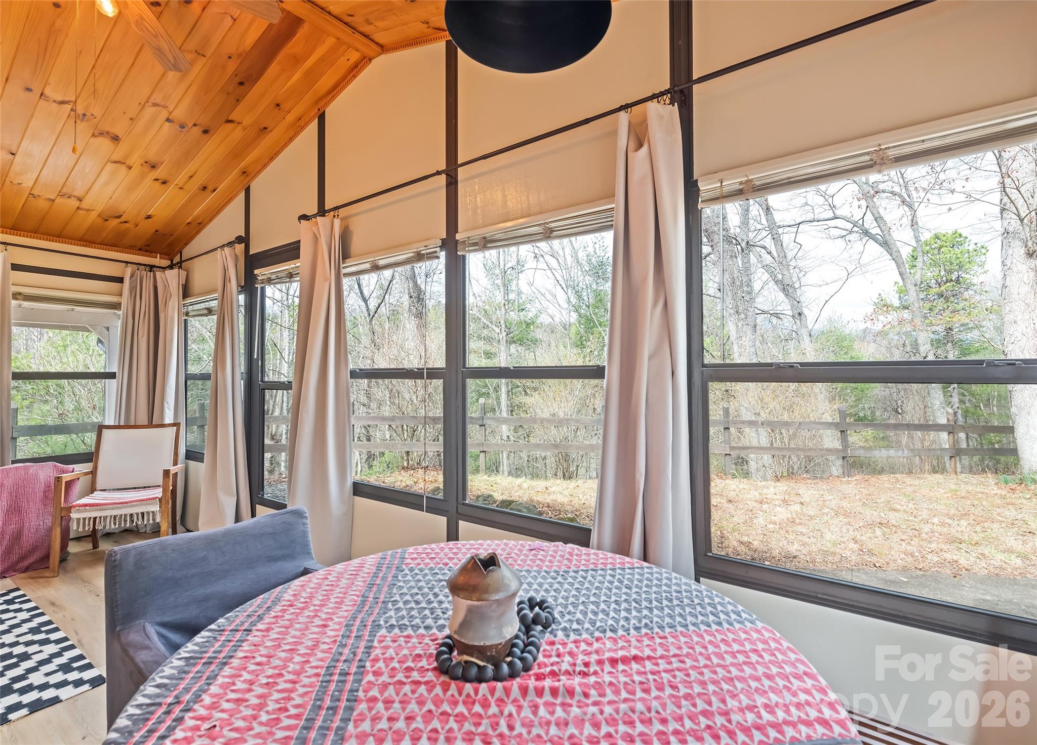 171 Fortner Road Bryson City, NC 28713 - Photo 12 of 32 a bedroom with a large bed and a window