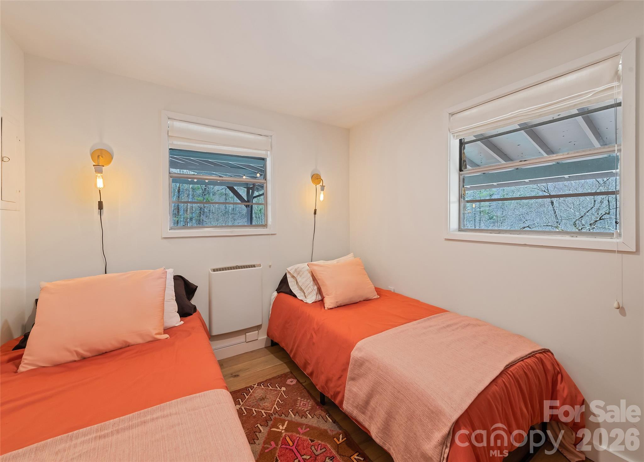 171 Fortner Road Bryson City, NC 28713 - Photo 16 of 32 a bedroom with two beds and a window