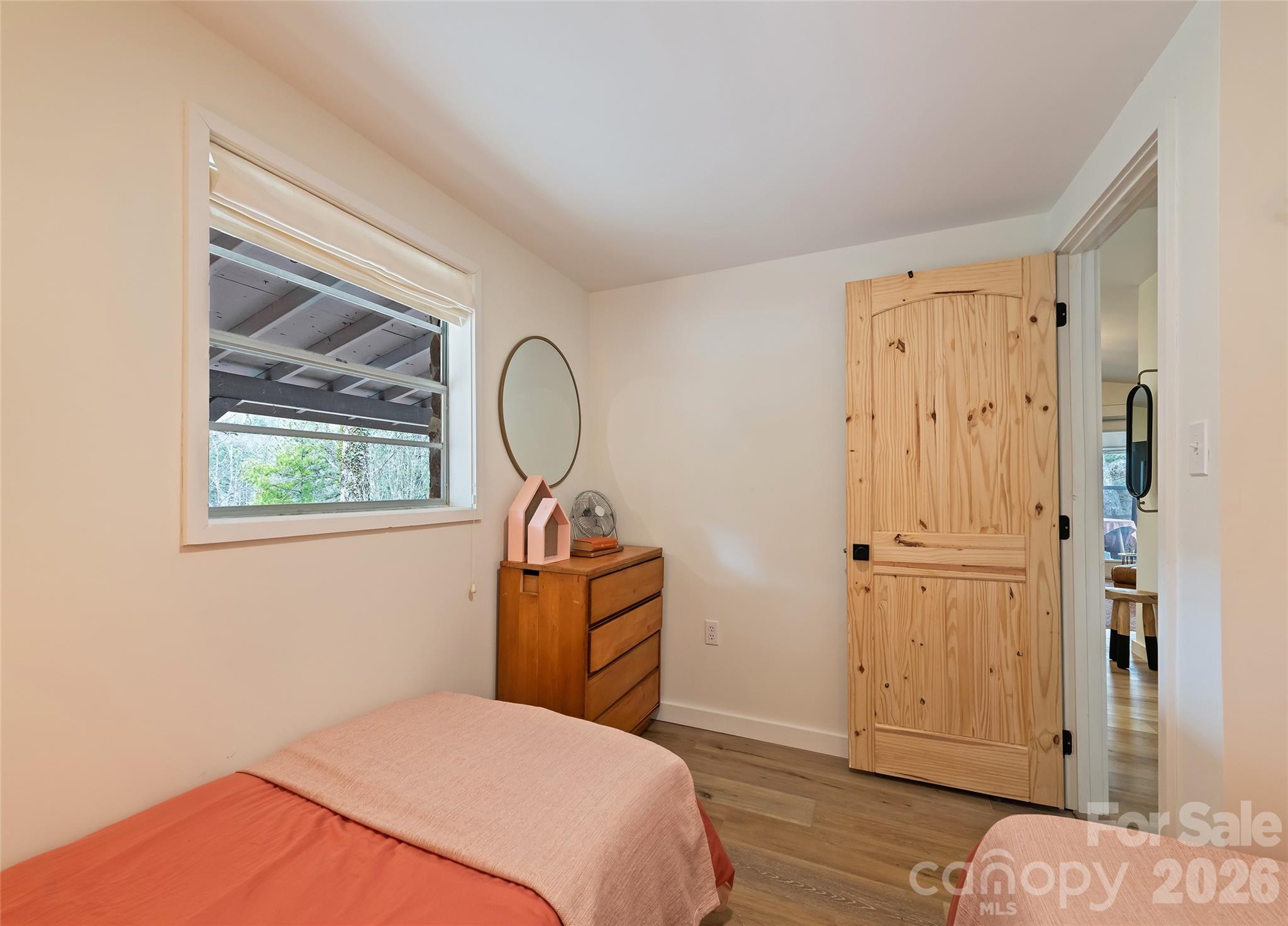 171 Fortner Road Bryson City, NC 28713 - Photo 17 of 32 a bedroom with a bed and a painting on the wall
