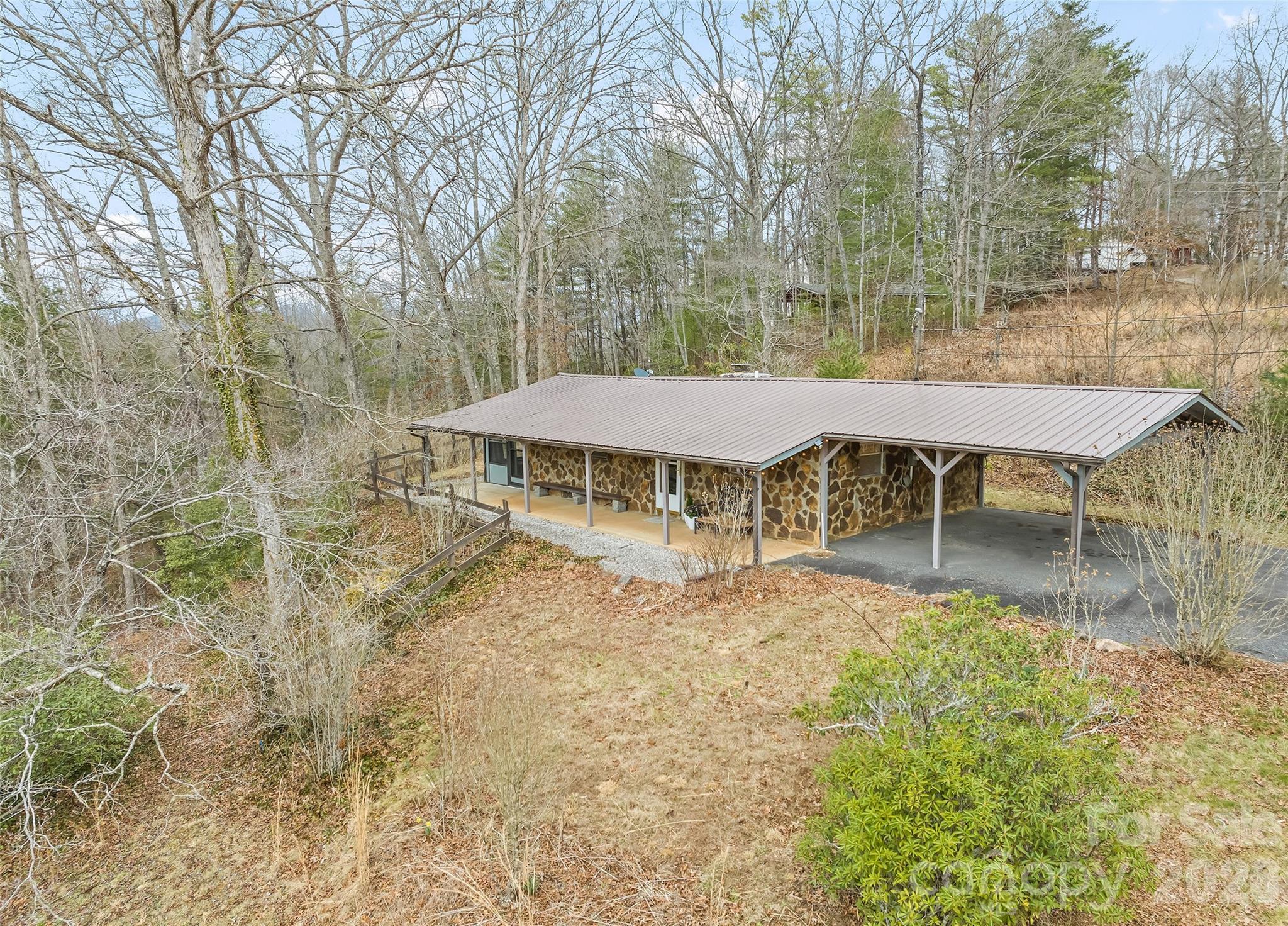 171 Fortner Road Bryson City, NC 28713 - Photo 23 of 32 a view of a house with backyard and wooden fence