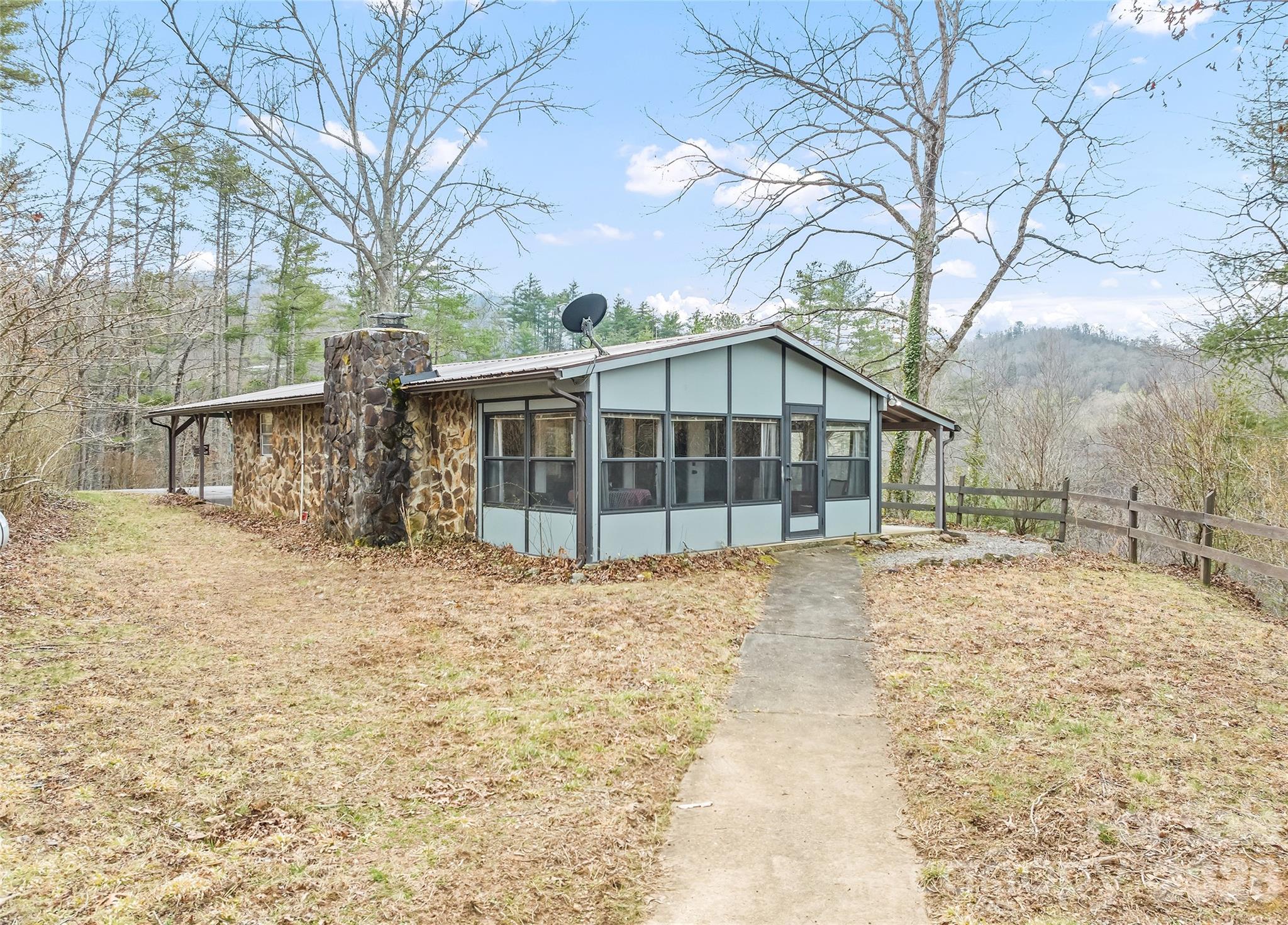 171 Fortner Road Bryson City, NC 28713 - Photo 24 of 32 a view of a house with a yard covered in snow
