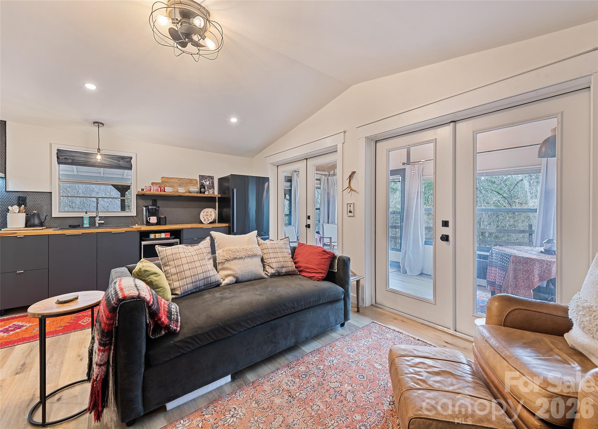 171 Fortner Road Bryson City, NC 28713 - Photo 7 of 32 a living room with furniture and a rug