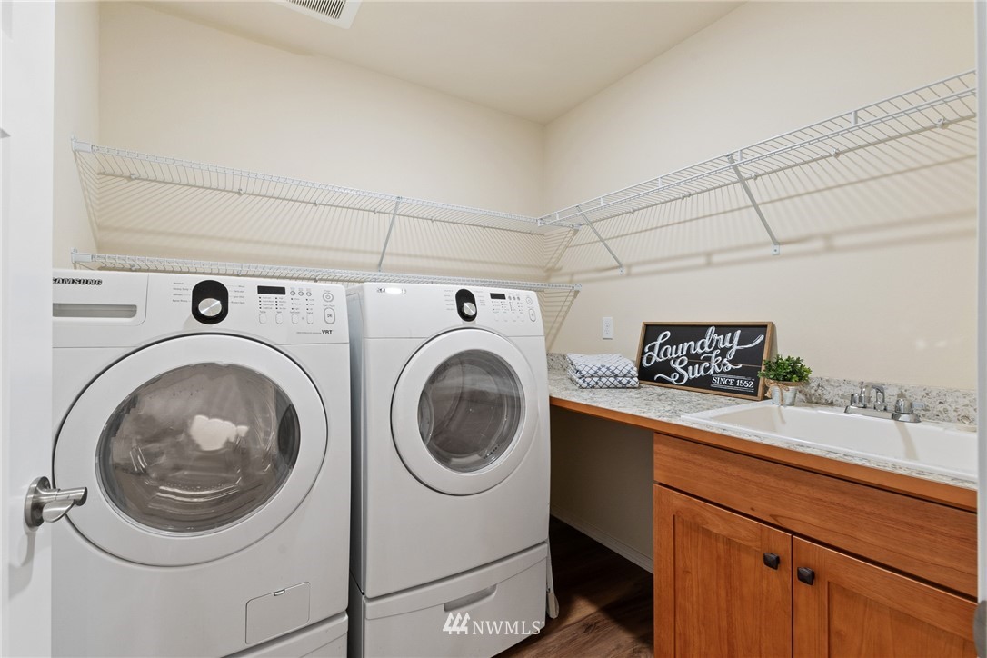 17839 Southeast 128th Street Renton, WA 98059 - Photo 21 of 35 a utility room with dryer and washer