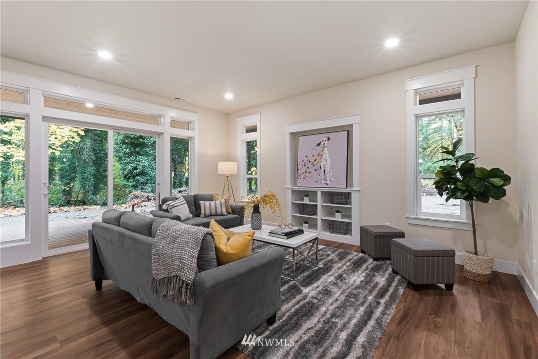 17839 Southeast 128th Street Renton, WA 98059 - Photo 5 of 35 a living room with furniture and a large window