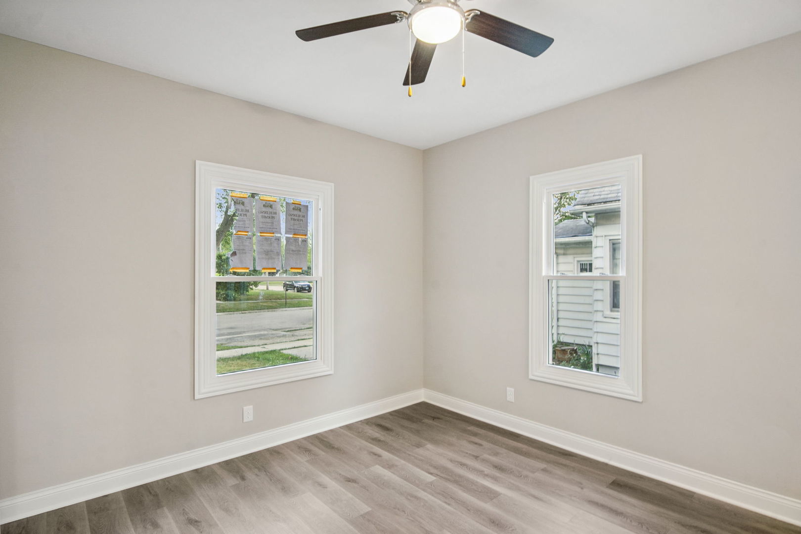 1424 Clark Street DeKalb, IL 60115 - Photo 11 of 23 an empty room with windows and closet