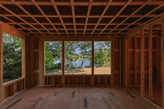 a view of a room with a large window