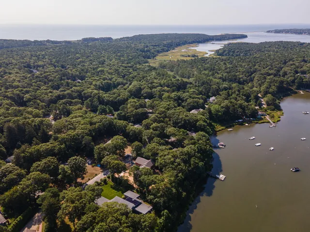 a view of a city with mountains in the background