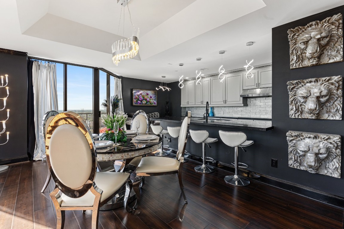 3350 McCue Road, Unit 2404 Houston, TX 77056 - Photo 11 of 49 a very nice looking dining room with furniture window and wooden floor
