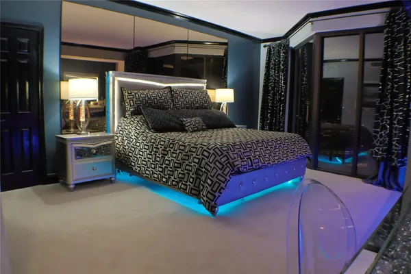 a kitchen with granite countertop a sink and cabinets