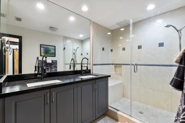 a kitchen with a sink and refrigerator