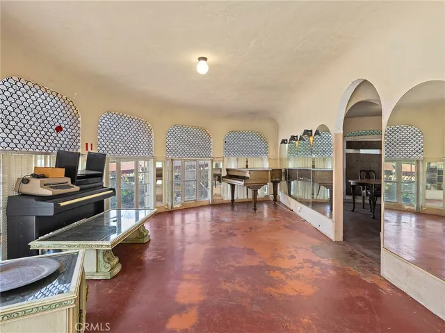 a living room with fireplace furniture and a flat screen tv