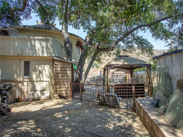 a wooden door in front of a house