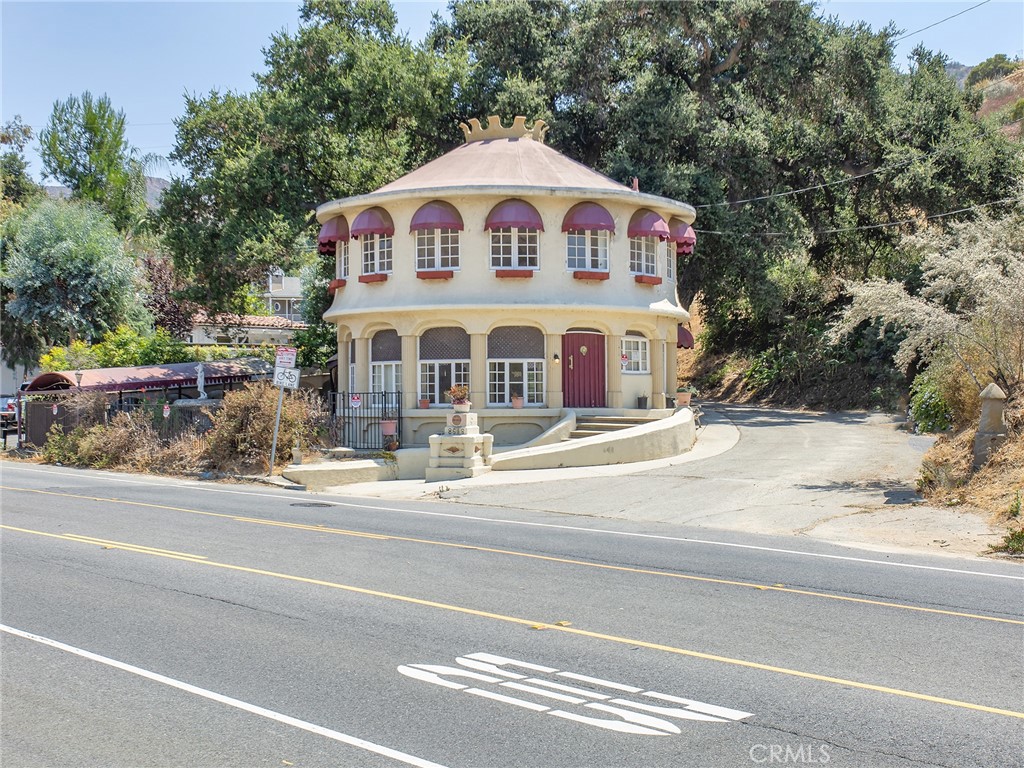 8618 La Tuna Canyon Road Sun Valley, CA 91352 - Photo 36 of 50 a view of a house with a yard and large trees