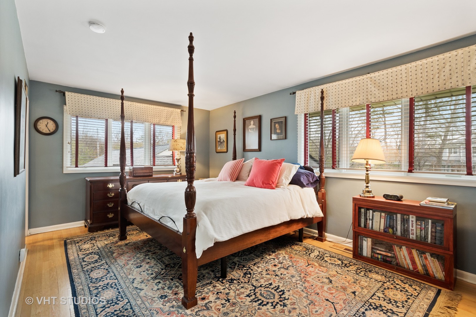 375 Maple Row Northfield, IL 60093 - Photo 18 of 38 a bedroom with a bed a dresser and windows