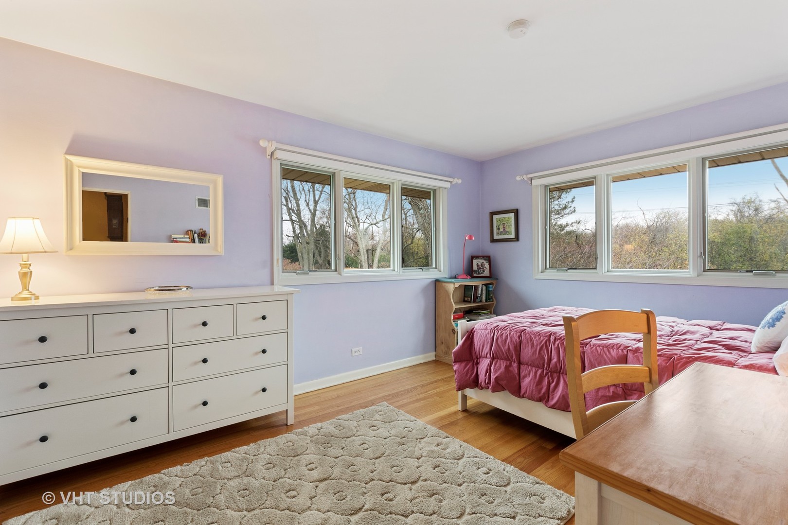 375 Maple Row Northfield, IL 60093 - Photo 21 of 38 a bedroom with a bed and a dresser