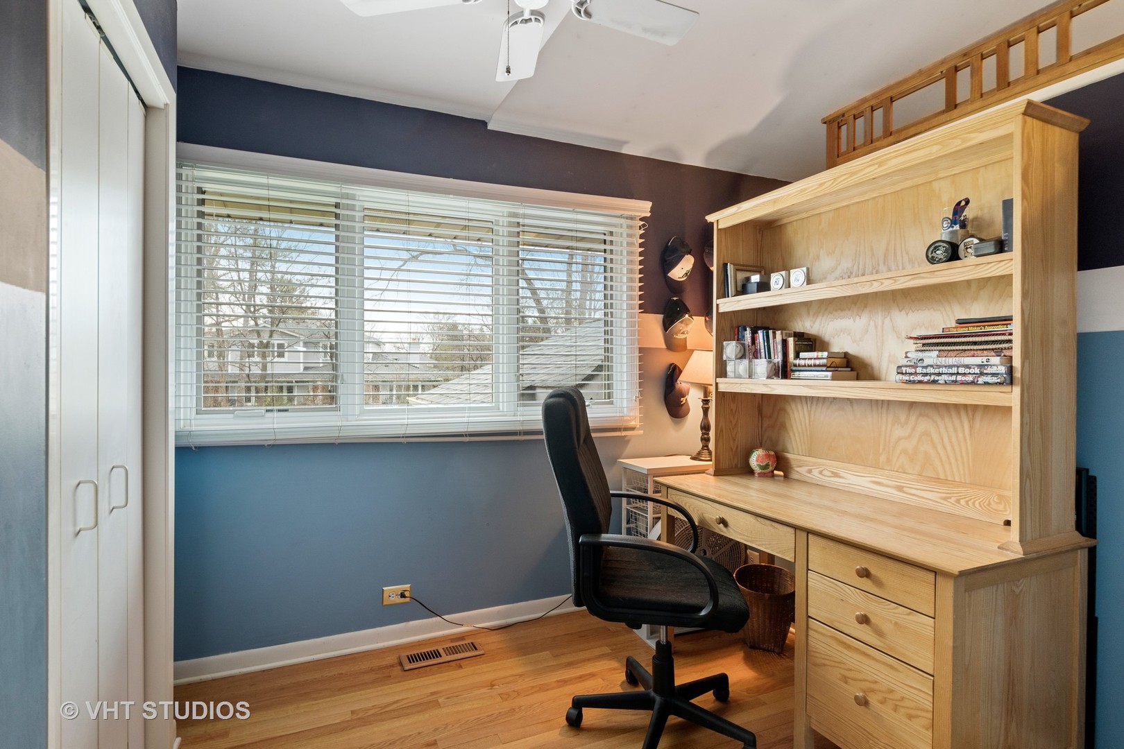 375 Maple Row Northfield, IL 60093 - Photo 22 of 38 a view of a workspace with furniture and a window