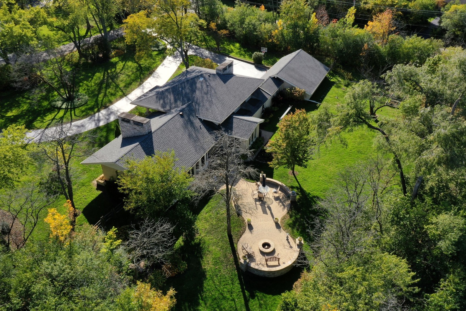 375 Maple Row Northfield, IL 60093 - Photo 30 of 38 an aerial view of a house with yard swimming pool and outdoor seating