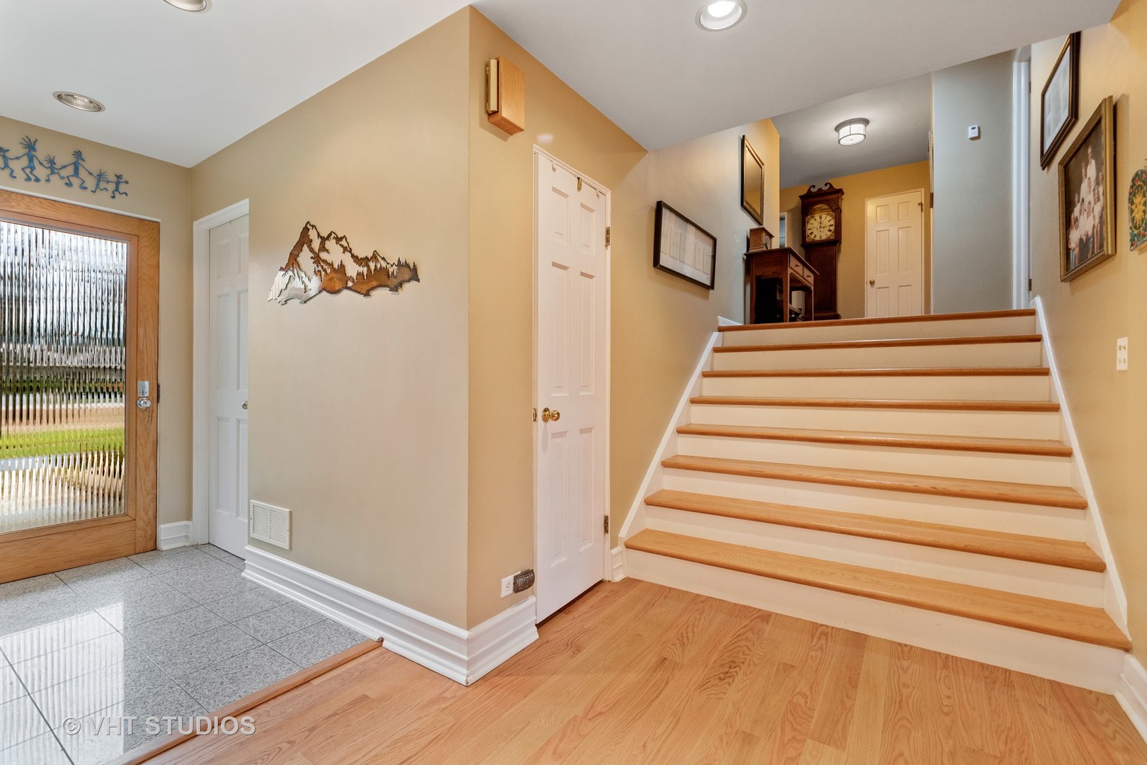 375 Maple Row Northfield, IL 60093 - Photo 5 of 38 a view of entryway and hall with wooden floor