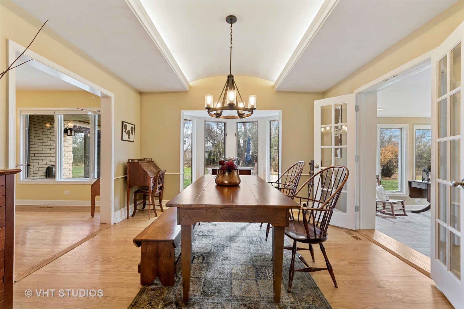 375 Maple Row Northfield, IL 60093 - Photo 8 of 38 a view of a dining room with furniture window and wooden floor