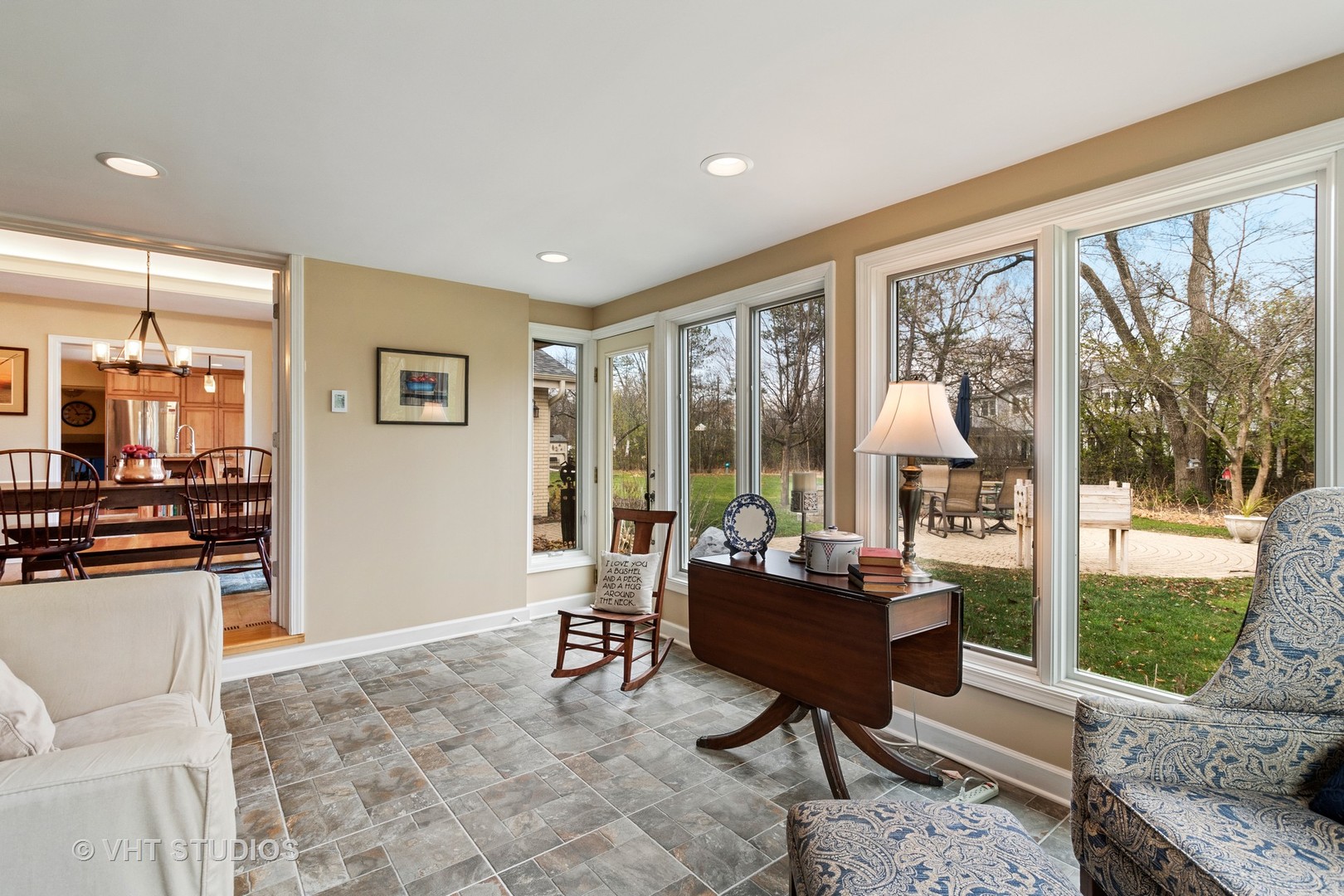 375 Maple Row Northfield, IL 60093 - Photo 10 of 38 a living room with furniture and a floor to ceiling window