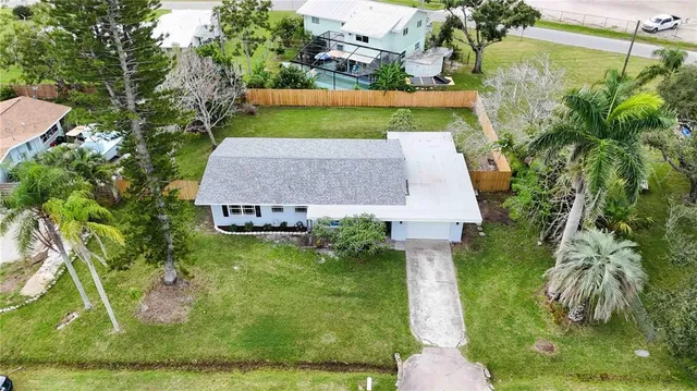 an aerial view of a house with garden
