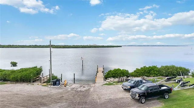 an aerial view of house with yard swimming pool and outdoor seating