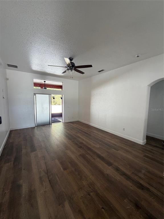 3020 Norlina Street Deltona, FL 32738 - Photo 13 of 30 a view of empty room with wooden floor