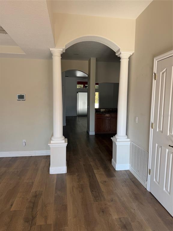3020 Norlina Street Deltona, FL 32738 - Photo 8 of 30 a view of entryway and hall with wooden floor