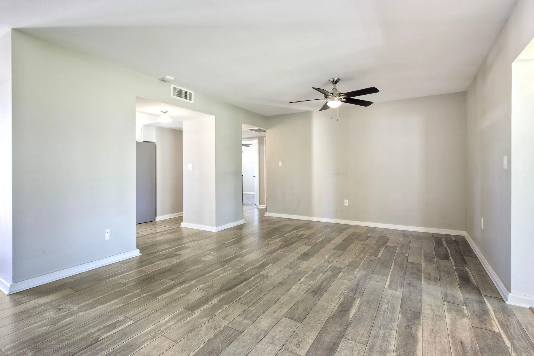 26055 Cherry Hills Boulevard Menifee, CA 92586 - Photo 19 of 31 wooden floor in an empty room