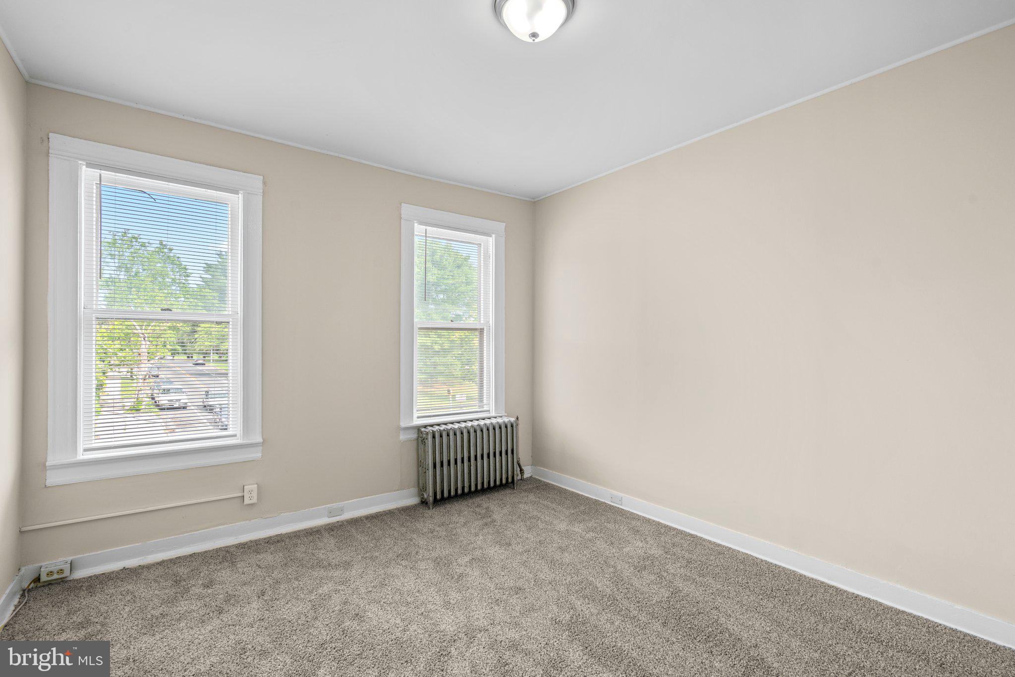 3703 Belair Road Baltimore, MD 21213 - Photo 13 of 30 Bedroom Two with neutral carpet & plenty of light