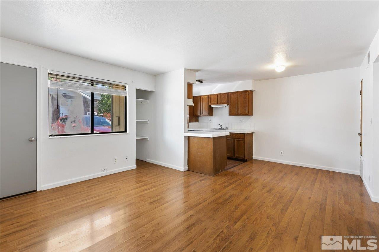 364 Wheeler Avenue Reno, NV 89502 - Photo 3 of 11 a view of a kitchen with a sink and a microwave
