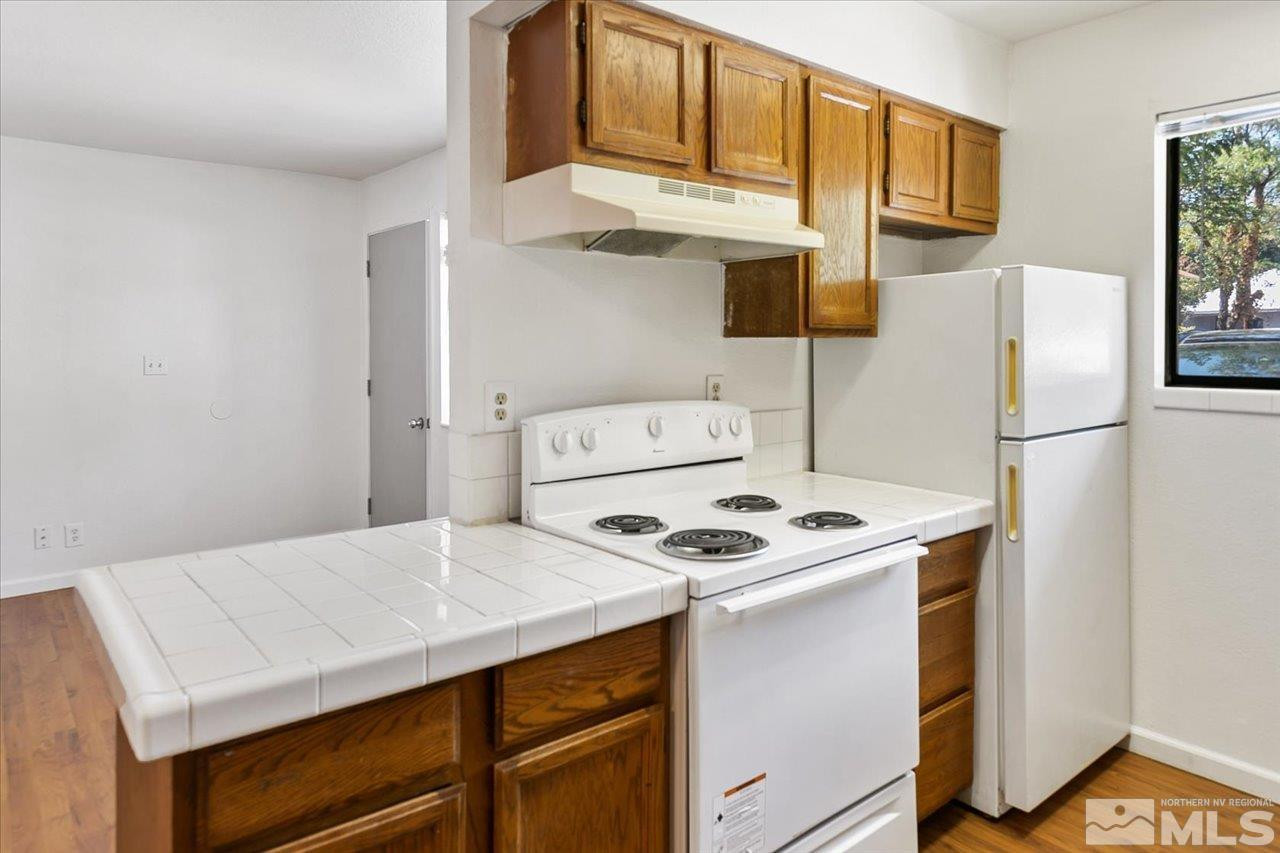 364 Wheeler Avenue Reno, NV 89502 - Photo 7 of 11 a utility room with dryer and washer