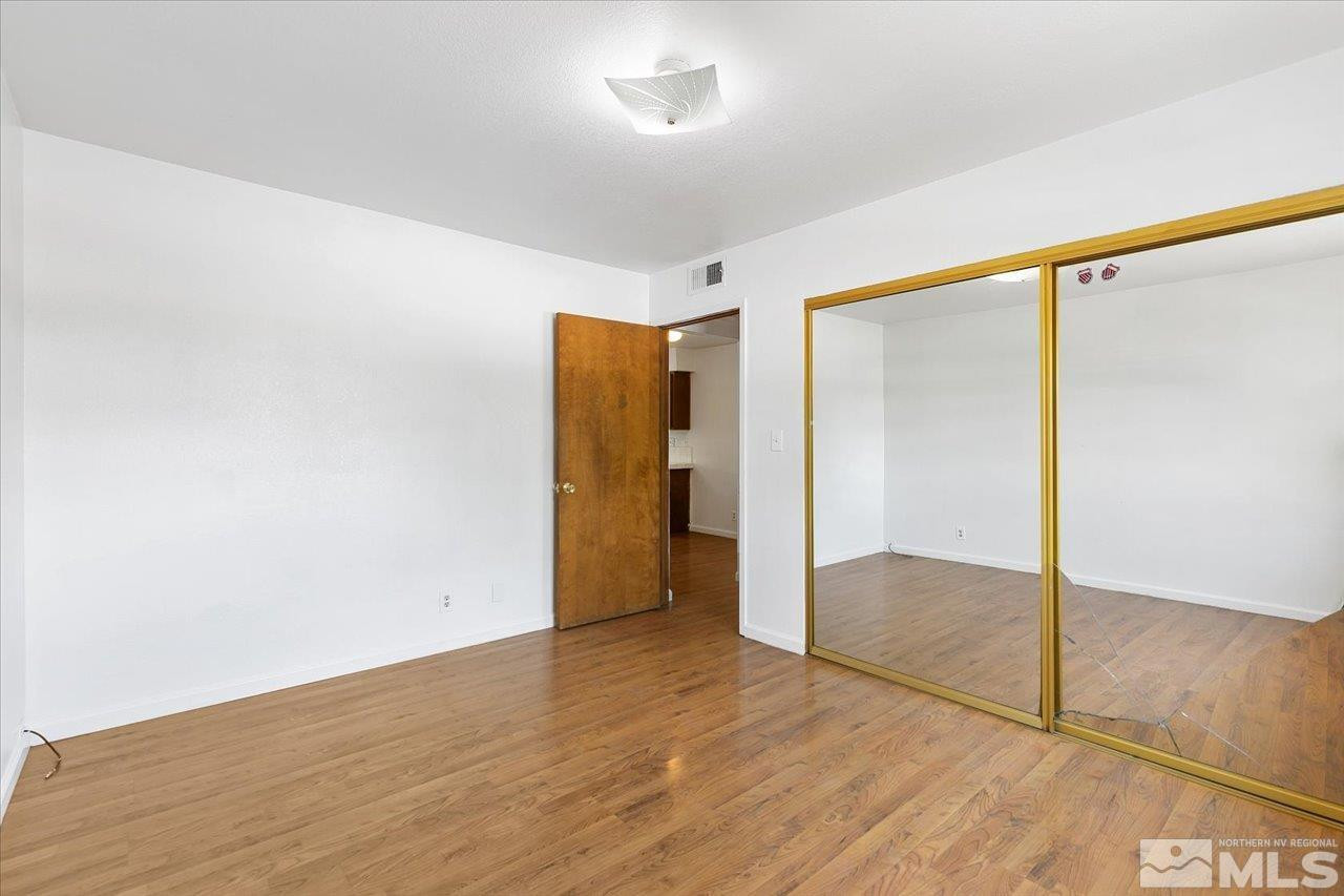 364 Wheeler Avenue Reno, NV 89502 - Photo 10 of 11 a view of empty room with wooden floor