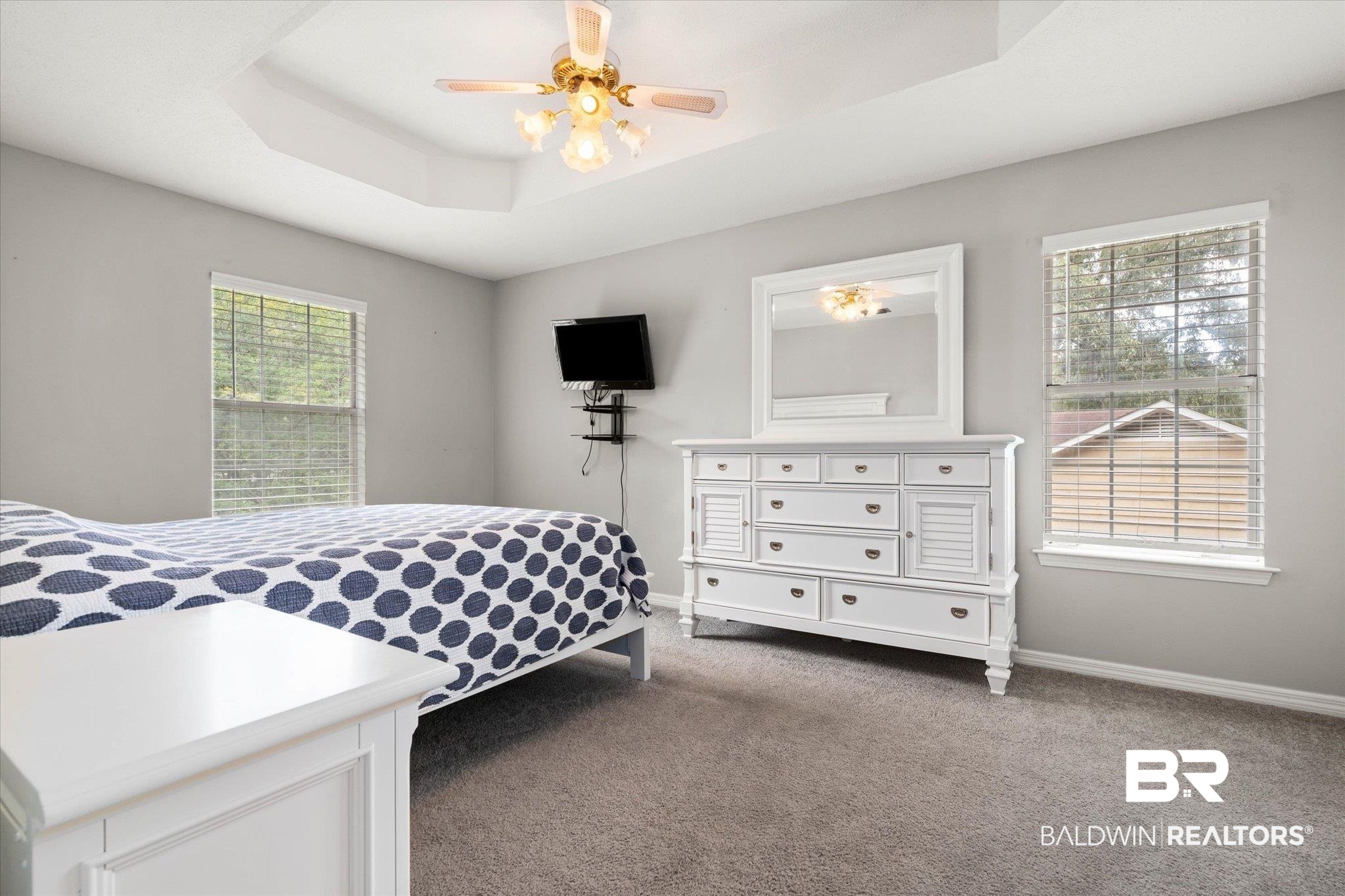 6632 Autumn Ridge Drive Mobile, AL 36695 - Photo 10 of 22 Carpeted bedroom featuring a tray ceiling and a ceiling fan