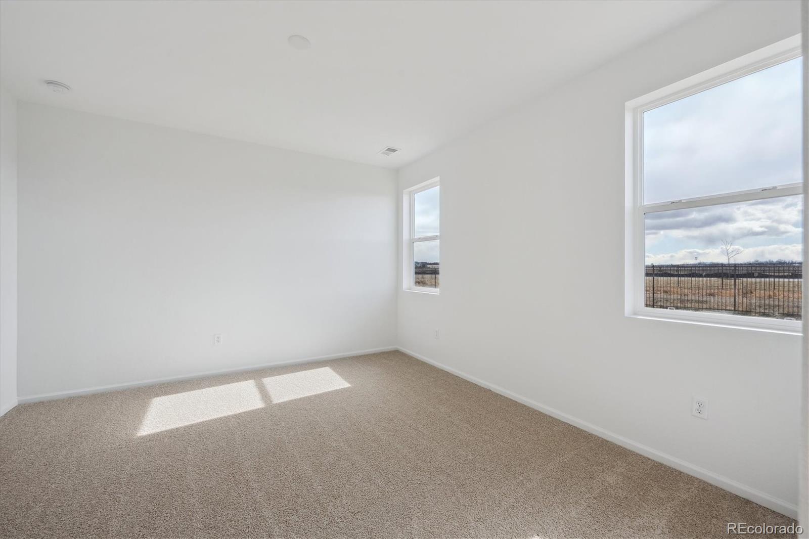 6122 Amerifax Drive Windsor, CO 80528 - Photo 11 of 21 an empty room with a window