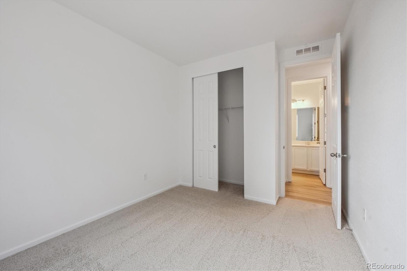 6122 Amerifax Drive Windsor, CO 80528 - Photo 18 of 21 a view of an empty room and closet