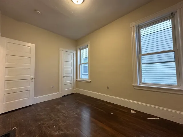 an empty room with windows