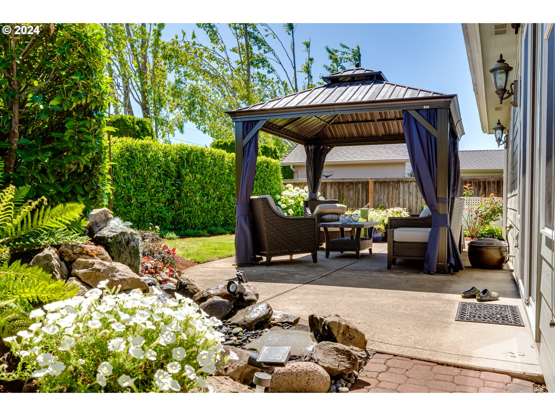 999 Old Orchard Lane Springfield, OR 97477 - Photo 25 of 34 a view of yard with an outdoor seating