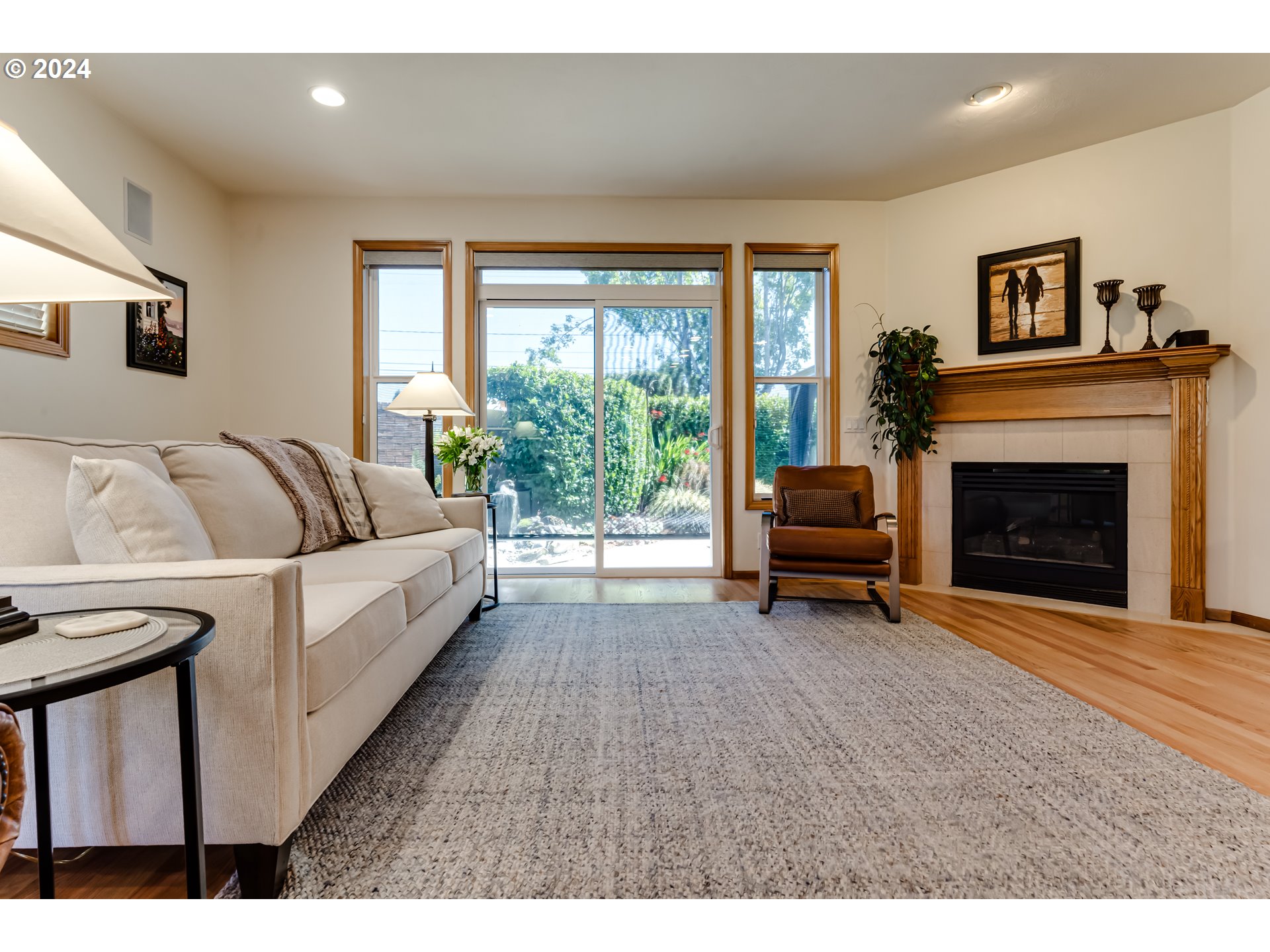 999 Old Orchard Lane Springfield, OR 97477 - Photo 3 of 34 a living room with furniture and a fireplace