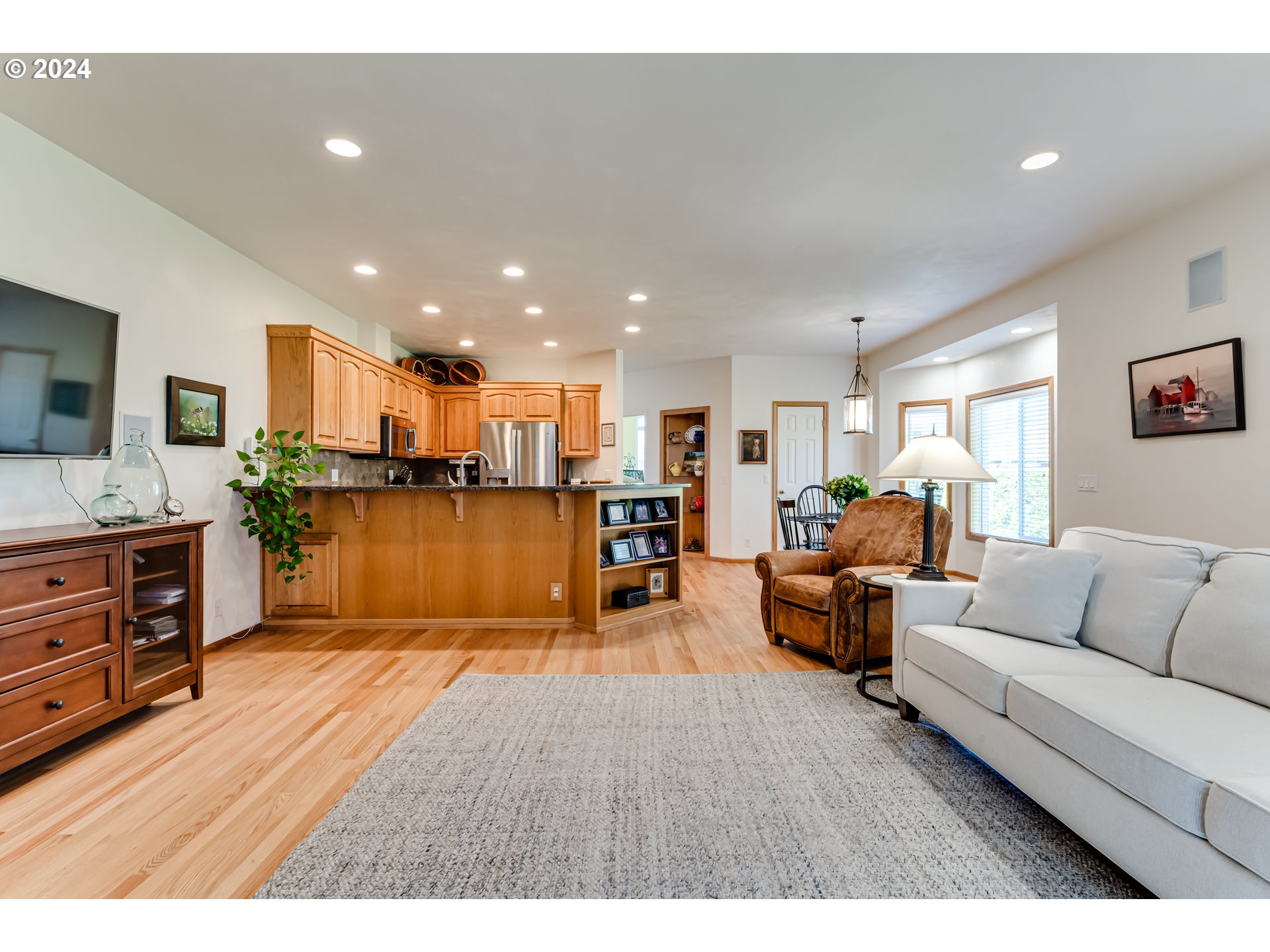 999 Old Orchard Lane Springfield, OR 97477 - Photo 5 of 34 a living room with furniture and kitchen view